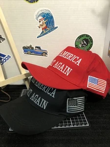 Trump Make America Great Again 2er Pack Baseballmützen Trump rot und Elon schwarz - Bild 1 von 6