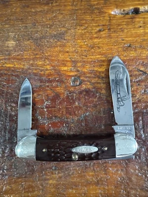 CASE XX 62131 RED BONE PRETTY BONE CANOE KNIFE WITH BLADE ETCH. - Image 1 of 4