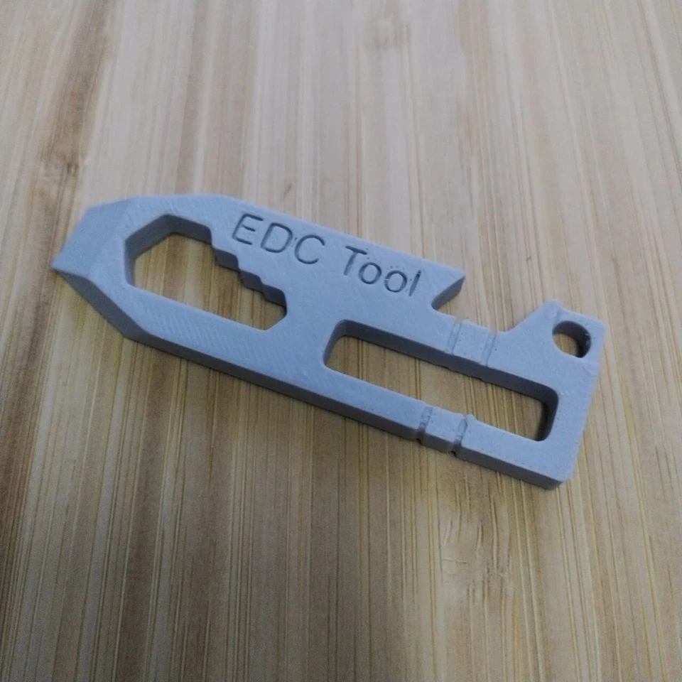 Multi-Function EDC Keychain Tool – 5-in-1 Compact Utility Tool (3D Printed) - Image 1 of 3