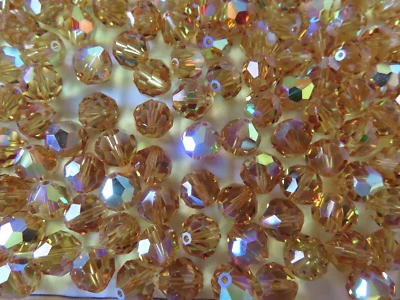24 cuentas de cristal Swarovski vintage (retiradas), topacio claro de 8 mm AB #39 (5300) Foto 1 de 2