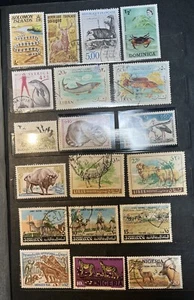 206 world stamps - Animals, Birds, Fish & Shells from 47 Countries In Stock Book - Picture 1 of 13