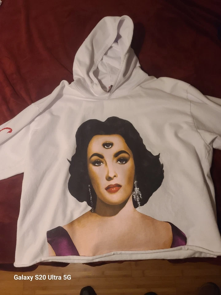 Blientele ARMANI CAESAR LIZ 2 SUDADERA CON CAPUCHA LADO OESTE GUNN GRISELDA POR FASHION REBELS Foto 1 de 3