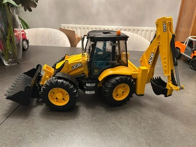 3 BRUDER строительные игрушки: JCB экскаватор экскаватор, Cat catterpiller, Land rover - Изображение 1 из 4