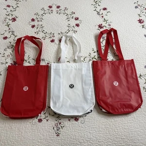Lotto di 3 nuove borse shopping riutilizzabili Lululemon 9x11,5 | 1 bianche 2 rosse - Foto 1 di 5