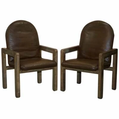 PAIR OF ORIGINAL MID CENTURY VINTAGE AGED BROWN LEATHER JOHN MAKEPEACE ARMCHAIRS - image 1 of 4