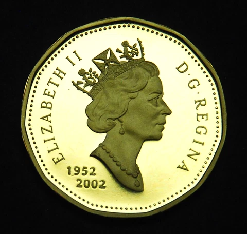 1952-2002 double dated  $1 loonie uncirculated fully proof - gorgeous coin Cover