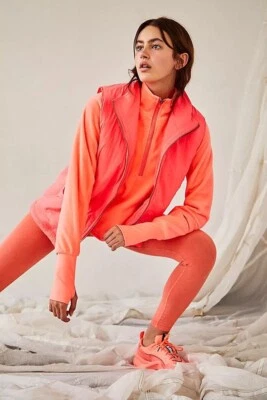 Nuevo con etiquetas Chaleco Reversible Free People Movement Hit The Hills Coral Neón Talla XS Foto 1 de 4