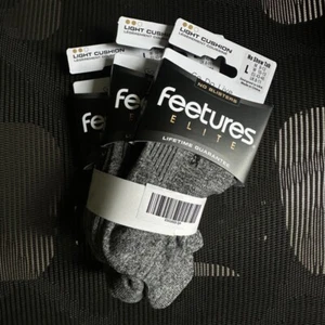 Feetures Elite Light Cushion No Show Tab, Gray, Size L Unisex 3 Pairs - Picture 1 of 3