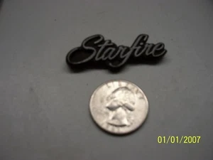 Olds Oldsmobile StarFire H Body Dash Plastic Emblem Badge Logo OEM 553902 2 - Picture 1 of 2