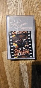 SHAKIN' STEVENS - CASSETTE TAPE - GREATEST HITS - UK 1984 ISSUE ON EPIC RECORDS - Picture 1 of 5