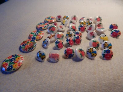 LOTE DE 43 BOTONES DE VIDRIO DE COLECCIÓN AÑOS 50 60 EN TOTAL FLORES PATOS POLLITOS CABALLO PALMERAS Foto 1 de 4