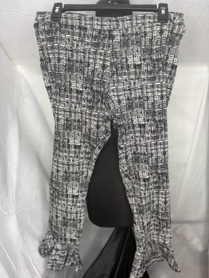 Pantalones Hot Kiss tiro alto con volantes dobladillo para mujer M negro blanco estampado abstracto elástico Foto 1 de 4