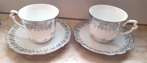 2 dekorative Kaffeetassen mit Untertassen aus Porzellan - Bild 1 von 2