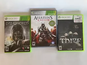 Xbox 360 Assassins Creed2, Thief, & Dishonored - Picture 1 of 8