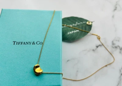 Ожерелье Tiffany & Co. Elsa Peretti Bean кулон желтое золото 18 карат 8,1 нк быстрая доставка - Изображение 1 из 4