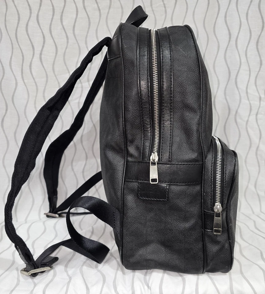 Mochila grande Michael Kors de cuero negro con bolsillos logotipo MK Foto 1 de 4