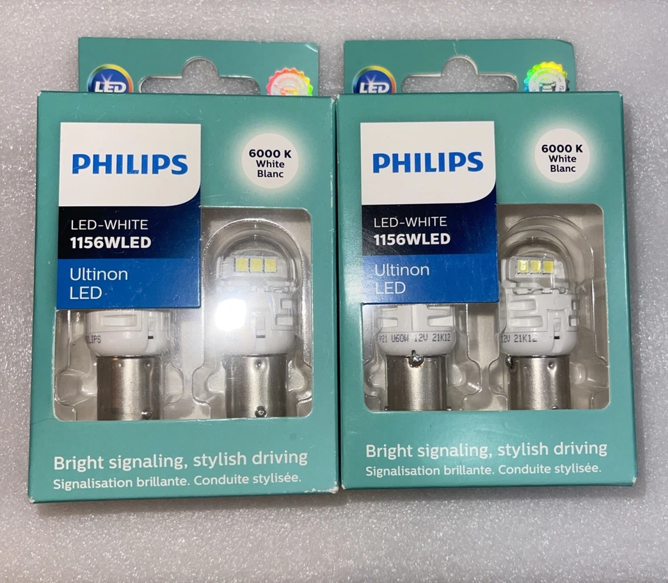 2 Paquetes De Philips Ultinon Luz LED 1156WLED 6K Bombillas Blancas Detener Freno - Caja NUEVA Foto 1 de 4