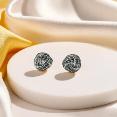 Silver Knot Stud Earrings, Curved Design, Sparkling Knot Earrings for Women. - Image 1 of 4
