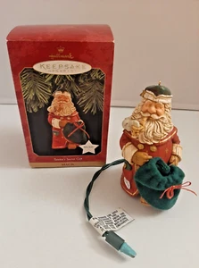 Hallmark 1997 Santa's Secret Gift Music Light Ornament - Picture 1 of 9