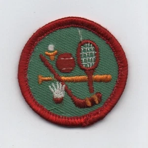 Muestreador deportivo, insignia de competencia Junior GS, parte posterior de gasa de plástico (1980-99) - Imagen 1 de 1