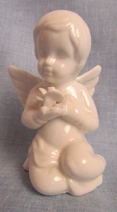 ANGELO BAMBINO CHERUBINO PORCELLANA VINTAGE 4" CHE TIENE FIORE - Foto 1 di 5