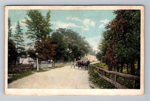 Horses & Wagon Traveling Down Road Vintage Souvenir Postcard - Picture 1 of 2