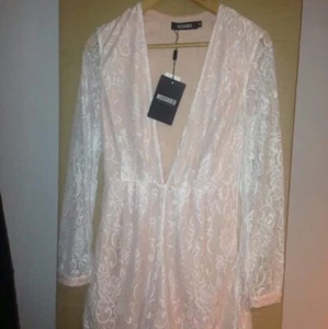 Missguided - Nude And Lace Long Sleeve Playsuit. Deep Plunge Neckline. - Picture 1 of 2
