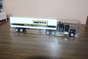 Herpa Kenworth HDT "Meyer" Koffer- Sattelzug schwarz Modellauto 1:87 H0 - Bild 1 von 4