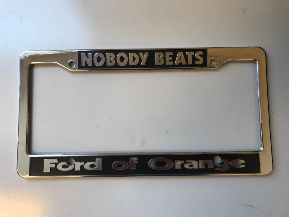Ford of Orange Nobody Beats CA License Plate Frame. Made of plastic. New. - Image 1 of 1