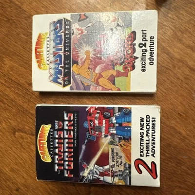Vintage 1985 Car Tune TRANSFORMERS + MASTERS OF THE UNIVERSE Cassette Lot of 2 - Image 1 of 4