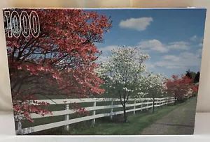 Vintage RoseArt 1000 Piece Puzzle Dogwood And Fence - Picture 1 of 2