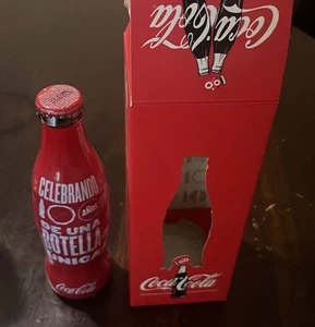 BOTTIGLIA COMMEMORATIVA COCA COLA PIENA UNICA 100 anni CELEBRAZIONE ARGENTINA - Foto 1 di 3