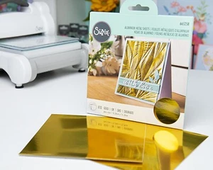 Sizzix 6" x 6" Gold 10pc Aluminium Sheets #665258 Retail $9.99 Adhesive backed - Picture 1 of 3