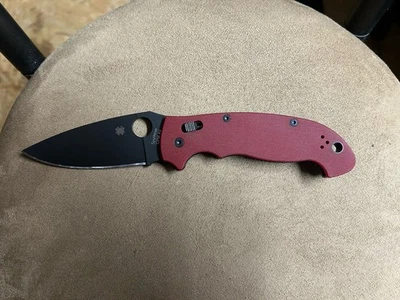 Spyderco Manix 2 XL St. Nick’s Exclusive Black DLC CPM-4V Red G10 - Image 1 of 3