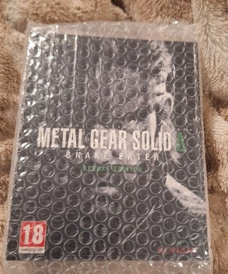 VENDEDOR DE EE. UU. Metal Gear Solid Delta Snake Eater Edición Deluxe Exclusivo SteelBook Foto 1 de 3