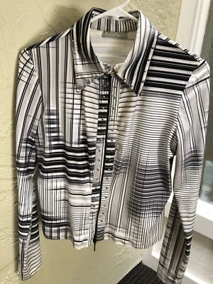 CHAQUETA CON CREMALLERA ALBERTO MAKALI BLANCA Y NEGRA MUY SEXY Foto 1 de 3