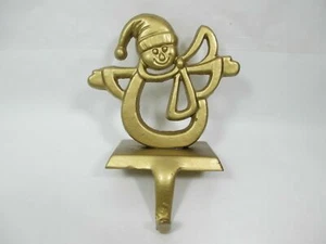 Gancho para colgar medias de hierro fundido pintado dorado muñeco de nieve chimenea manto usado - Imagen 1 de 10