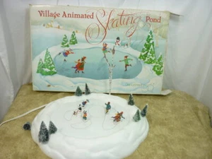 Estanque de patinaje animado Dept 56 Village 5229-9 25E066 - Imagen 1 de 7
