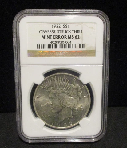 1922 Peace Silver Dollar - NGC MS 62 - Obverse Struck Thru Mint Error - 004 Cover