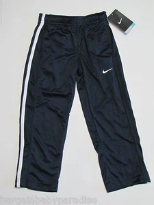 NUEVOS CON ETIQUETAS Nike Dri Fit Pantalones Atléticos de Calentamiento de Pista y Campo Niños Talla 4 $34 - Imagen 1 de 4