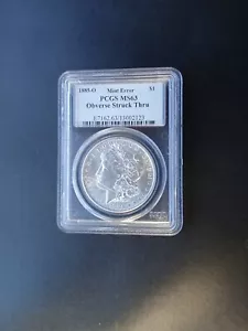 1885-O Morgan Silver Dollar OBVERSE STRUCK THRU PCGS MS 63 Pictures included - Picture 1 of 5