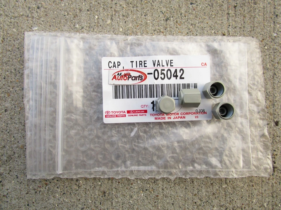 12 - 21 LEXUS RX350 / RX450H TIRE VALVE STEM GRAY PLASTIC CAPS OEM QTY = 4 NEW - Image 1 of 4