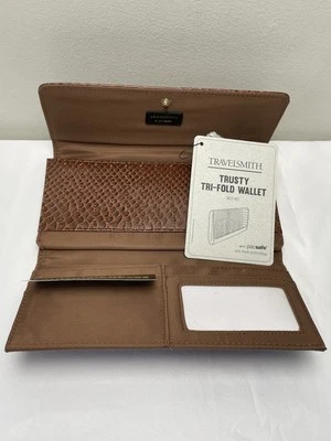 Cartera Travelsmith Trusty triple plegable tecnología Pacsafe nueva con etiquetas RFID segura marrón Foto 1 de 4