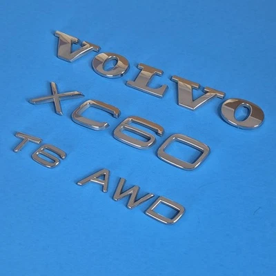 Volvo XC60 T6 2010-2017 AWD emblema letras números puerta trasera emblema cromado Foto 1 de 4