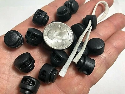 Tapón de bloqueo de cable redondo de plástico negro con cordón de resorte Paracord 2 orificios CL8 Foto 1 de 4