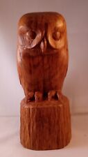 Tawny Owl carved in Brown English Oak displayed on sitting on a tree stump