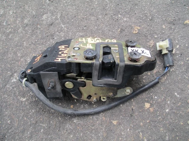 Привод дверного замка левый задний для водителя 2001 Kia Spectra - Изображение 1 из 2