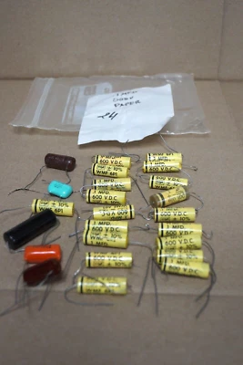 Lote de 24 tapas sumergidas en papel marca CDE .1uf 600V.LEER Foto 1 de 3