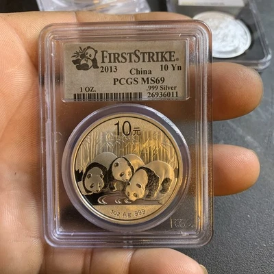 CHINA 2013 FIRST STRIKE SILVER  PANDA 10 YN PCGS MS69 - Image 1 of 2