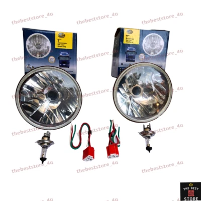 Faro halógeno universal transparente Hella de 7 pulgadas para Jeep (juego de 2) Foto 1 de 4